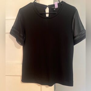 Banana republic short sleeve blouse. Always dry cleaned.